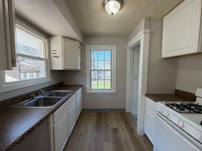 Photo - Charming 2-Bedroom Home with Secure Front Porch, Carport & Big Yard in Goodyear Heights