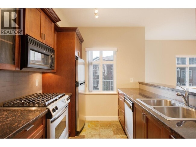 Photo - 7388 Macpherson Ave Unité 102