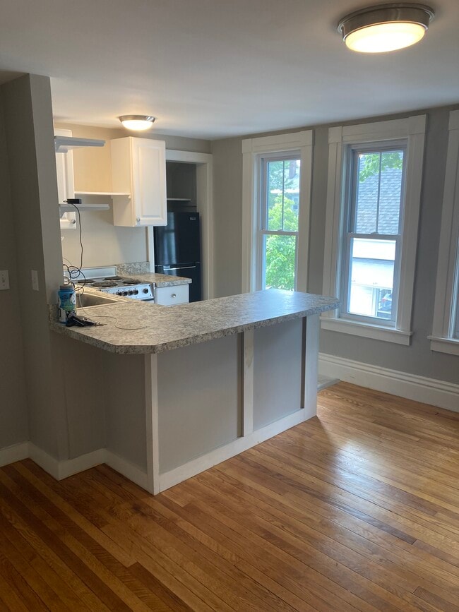Efficiency kitchen with electric range - 56 Rumford St Unit #3