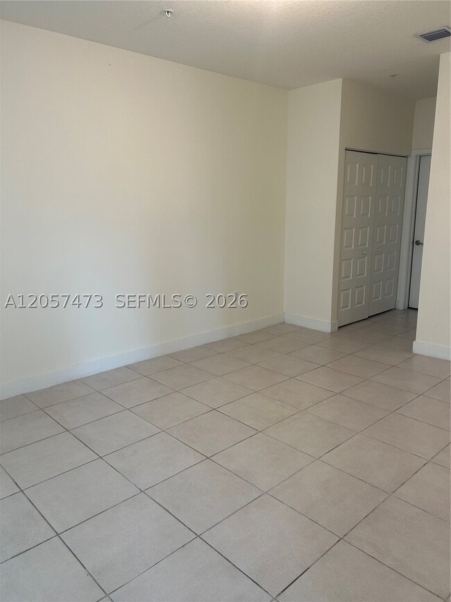 Building Photo - 8363 NW 41st St Unit A-204