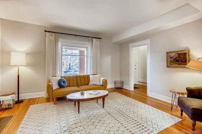 Photo - "Charming 4-Bed Oasis with 2.5 Baths in the Heart of Denver – 1768 Sq Ft of Comfort!"