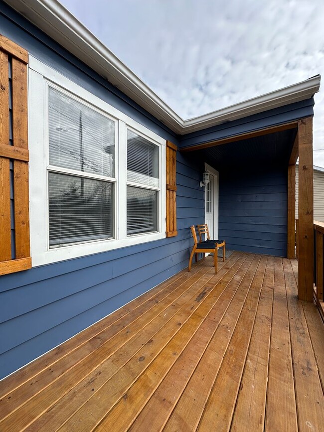 Photo - Immediate Move-In! Renovated 2BR House Near Ball State w/ Fireplace & Outdoor Space