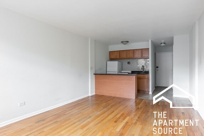 Building Photo - 5847 N Winthrop Ave Unit 403