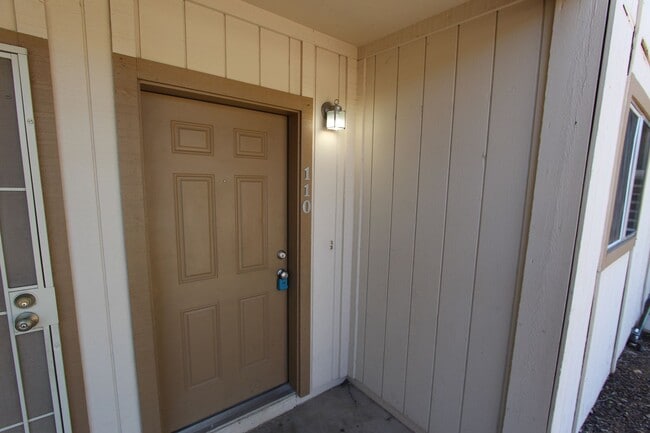 Photo - Ground-Level 2 Bedroom Condo in Pineview Village | Covered Parking + Storage Unidad 110