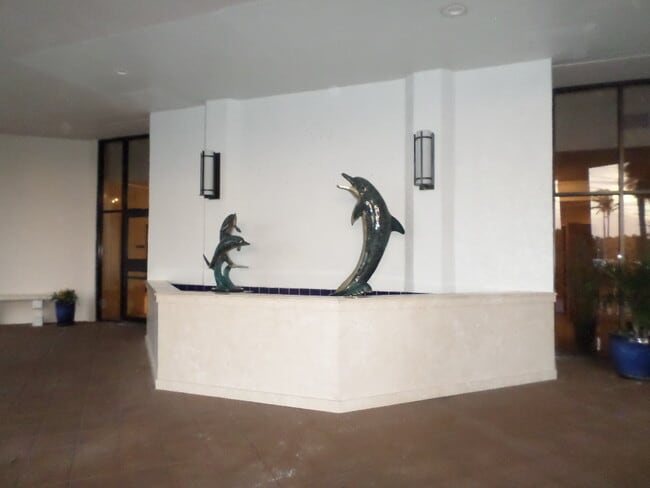 Spitting dolphin fountain to greet you! - 9650 S Ocean Dr Unit 1108 - Hutchinson Retreat