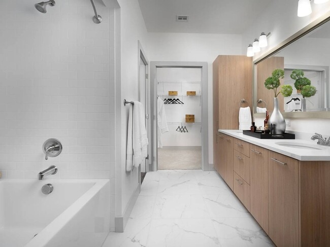A spacious closet sits at the far end, with hanging space on two levels.