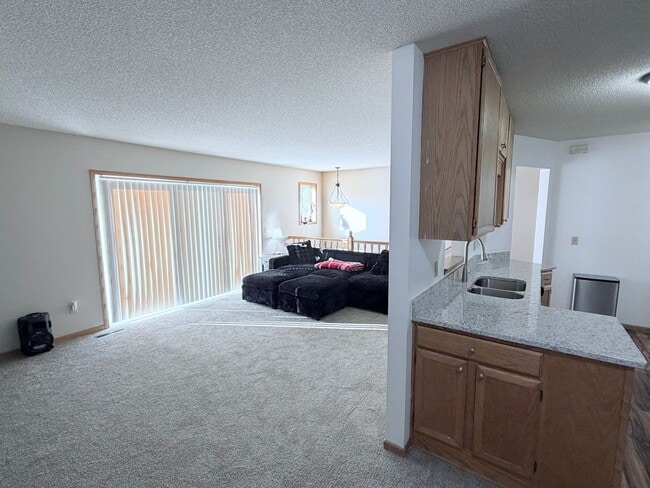 Photo - Spacious 2-Bedroom, 2.5 Bathroom, Tri-Level Townhome & Private Deck in Apple Valley!