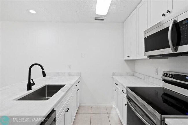 Photo - 3917 Cocoplum Cir