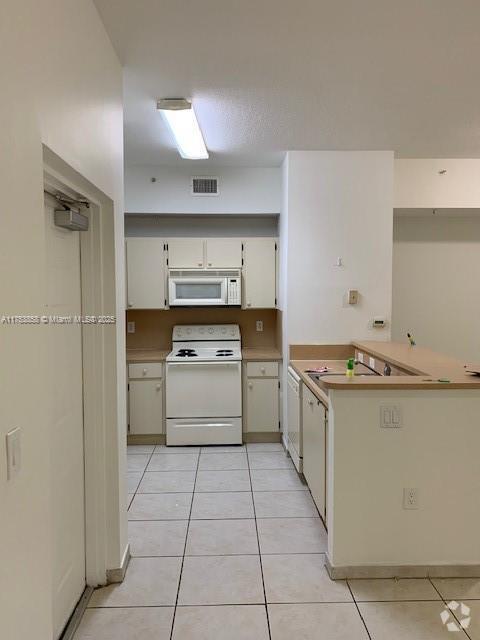 Building Photo - 7250 NW 114th Ave Unit 207 Rental