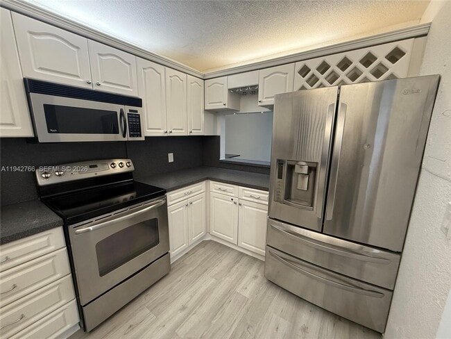 Photo - 9470 Live Oak Pl Unit 104