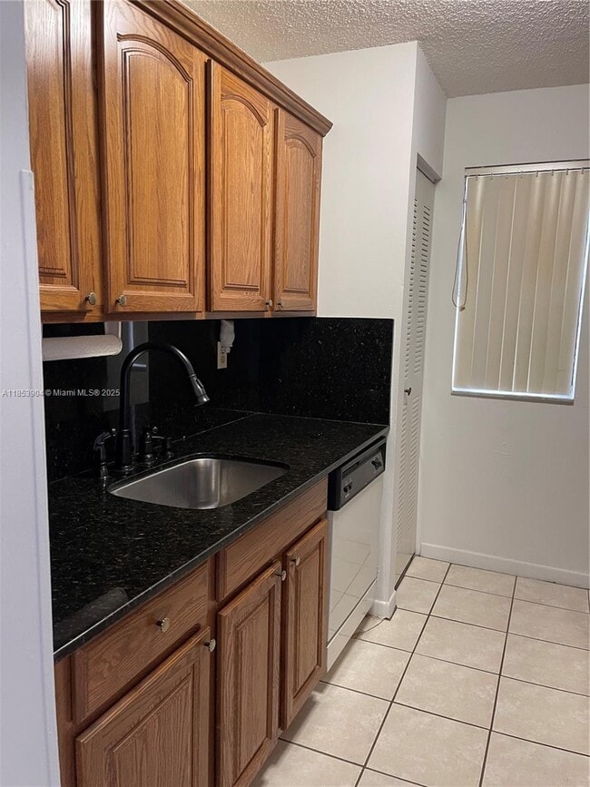 Building Photo - 15560 SW 80th St Unit K-101 Rental