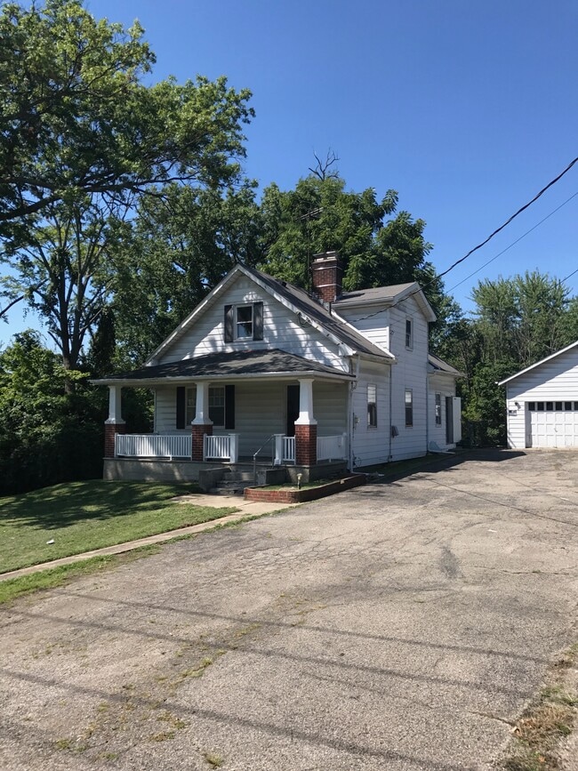 Front of house & 2 car garage + 8 parking spots - 8330 Clough Pike