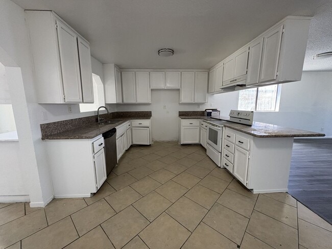 Photo - Large Living Area, rear yard has RV Access!