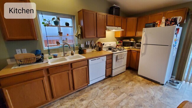 Photo - Charming 3 Bed, 2 Bath House with 2 Car Garage, Fenced Backyard and Central AC!