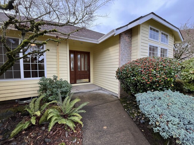Photo - Elegant Home Offering Open Living Spaces, Spacious Primary Suite, and Nature-Inspired Yard