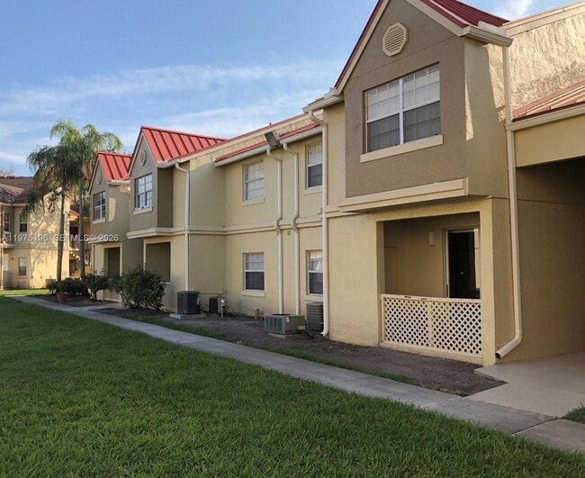 Building Photo - 18324 NW 68th Ave Unit M