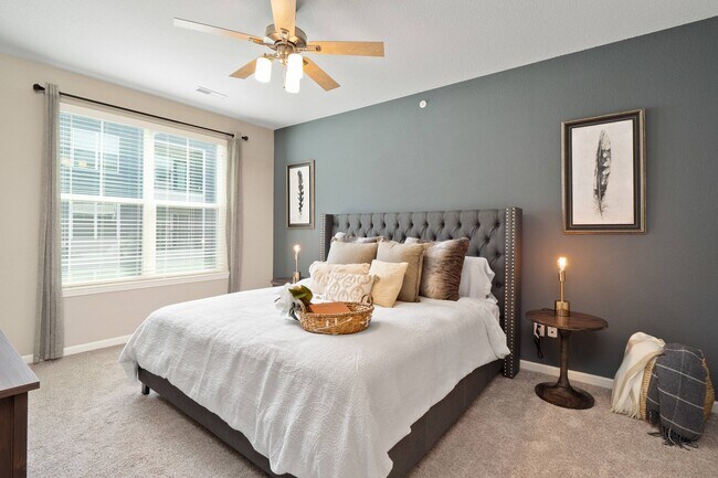 Spacious bedroom with ceiling fan