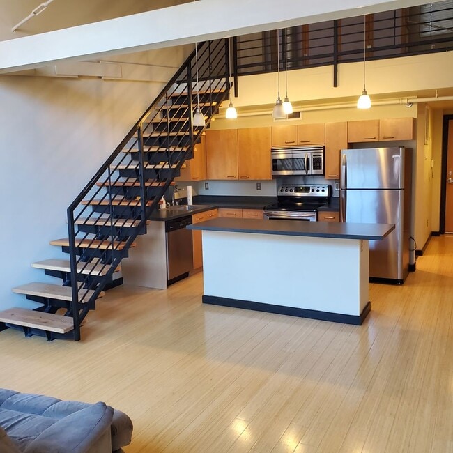 Building Photo - Albuquerque High Gym Lofts top floor