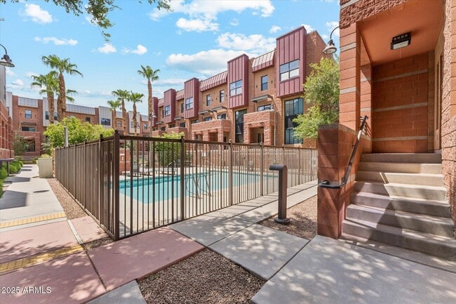 entrance steps on right - 330 S Farmer Ave