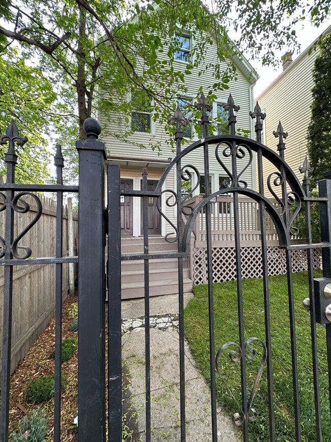 Building Photo - 2113 N Lorel Ave Unit 1