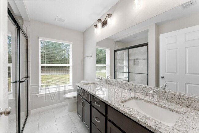 Building Photo - 9461 N Sandree Dr Rental