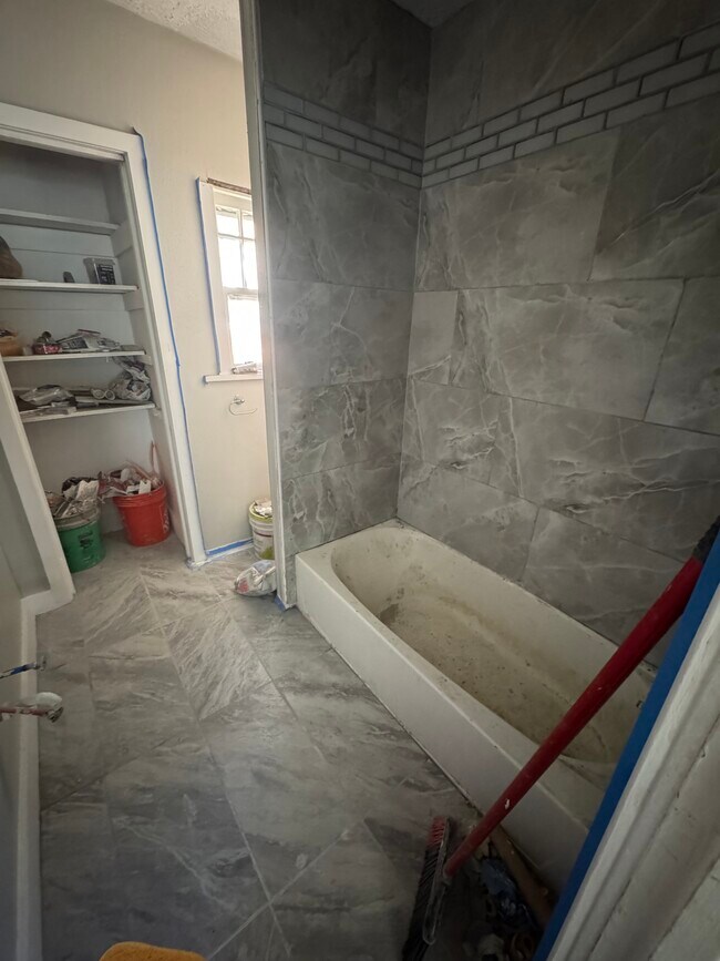 Medium sized bathroom, newly tiled, shelve space - 125 Blymyer Ave Unit 125 1.5