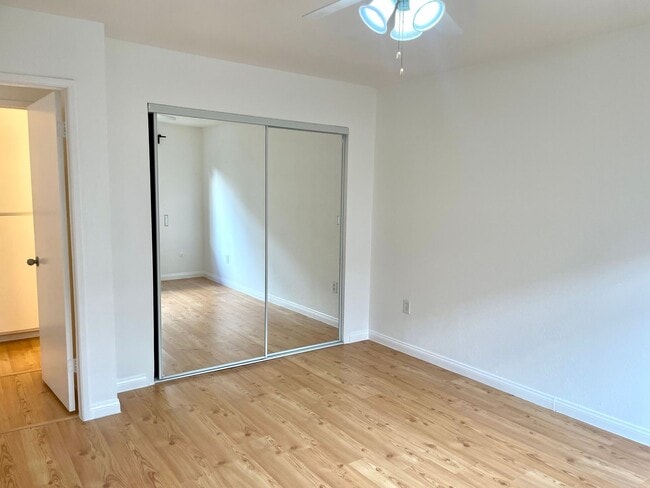 Photo - Beautiful 1 Bed/1 Bath Condo Apartment with Private Patio, Hardwood Flooring, Pool, and AC