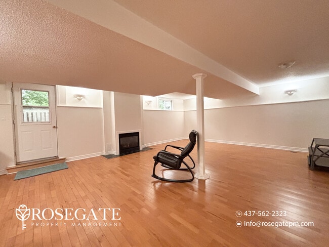 Photo - Spacious 2-Bedroom Corner Basement Apartment with Fireplace & 2 Parking Spaces – Barrie Unit 2