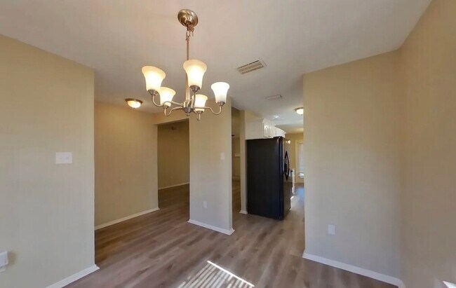 Photo - Spacious 3-Bedroom House with Cozy Living Spaces