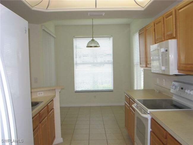 Building Photo - 9648 Hemingway Ln Unit 4402 Rental