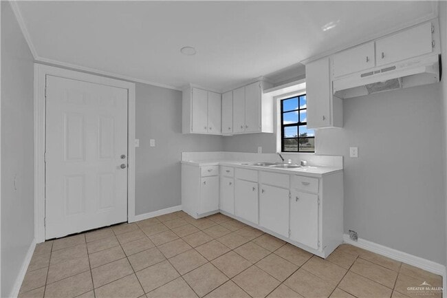 Photo - Charming 2-Bedroom Home with Central AC and Fenced Lot!