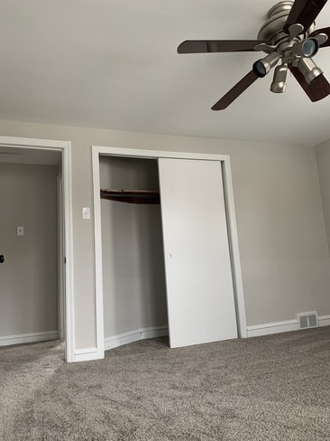 Main bedroom. Sliding closet doors.