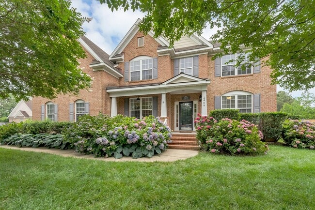 Building Photo - Beautiful brick home with a saltwater pool