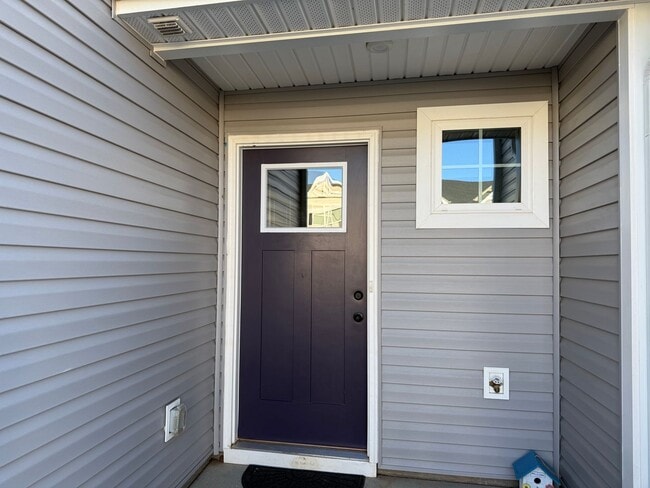 Photo - Modern 3-Bedroom Townhouse with Garage & Private Patio