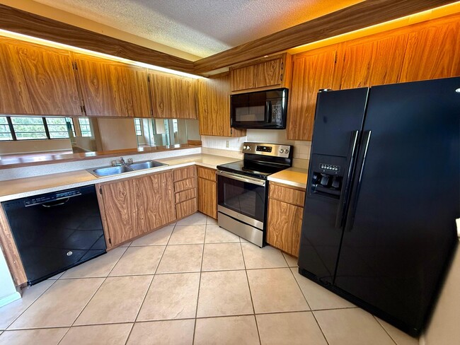 Building Photo - 3525 Village Blvd Unit 303 Rental