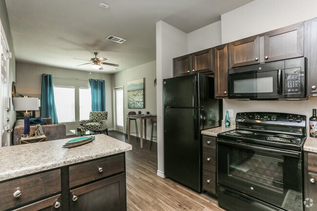 1BR, 1BA - 618SF Kitchen & Living Room