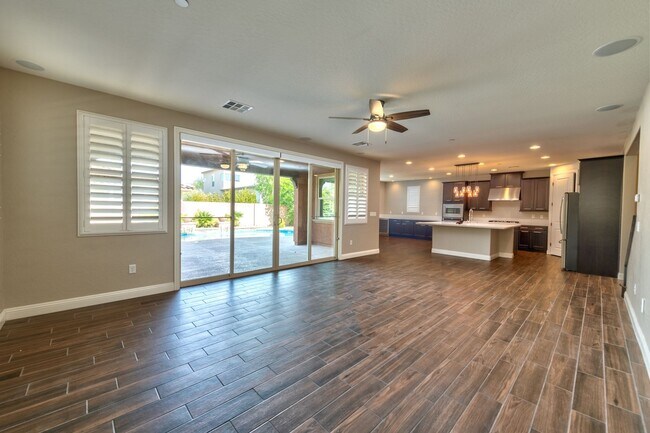 Photo - A unique Gem in Inspirada! 5 beds, 3 car, bedroom downstairs and Pool/spa!