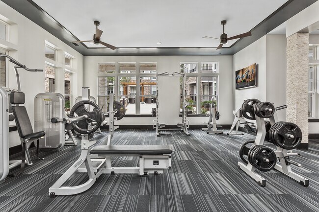 Fully-Equipped Fitness Center with Highly-Specialized Technogym Cardio Machines, Free Weights, Spin Bikes, and Individual Strength Training Machines