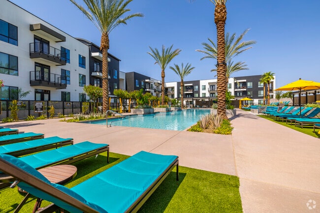 Resort-style pool with tanning area and view deck