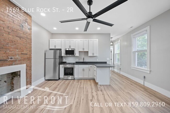 Building Photo - 1669 Blue Rock St Unit 2R