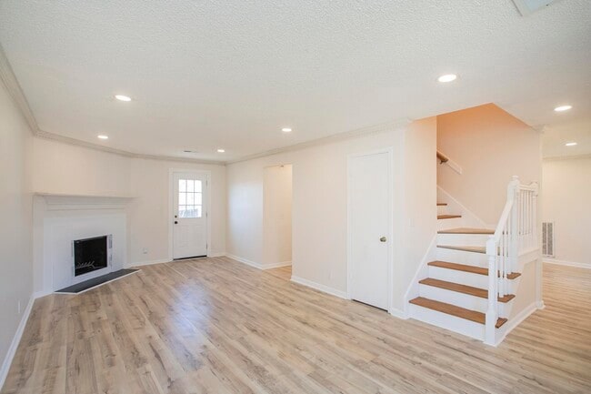 The open layout creates a comfortable space perfect for relaxing or entertaining - 105 Jacksons Retreat Ct