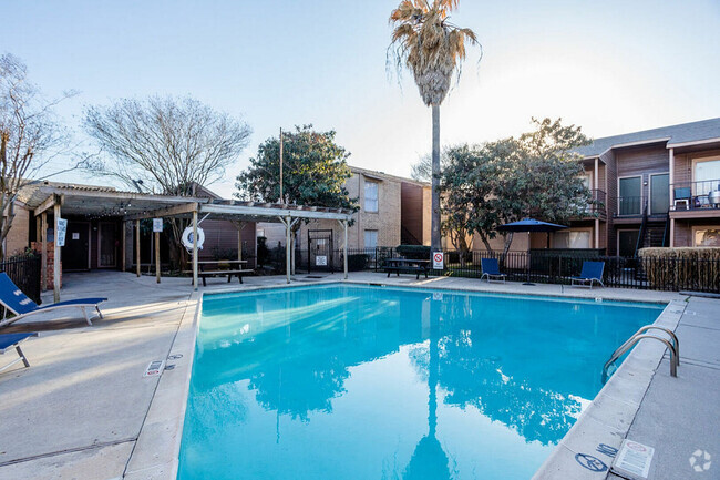 ake a refreshing swim in the sparkling pool, perfect for sunny days - Ridge Point Rental