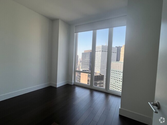 Building Photo - 222 E 44th St Unit 7G Rental