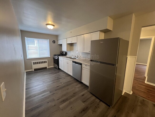 Building Photo - 4594 Hamilton Ave Unit 1