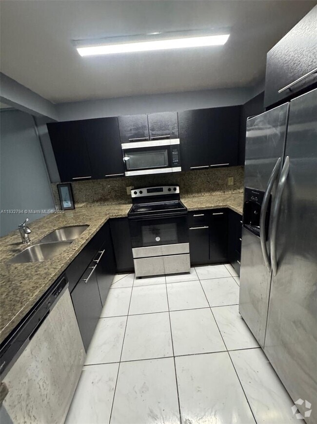 Building Photo - 5955 NW 25th Ct Rental