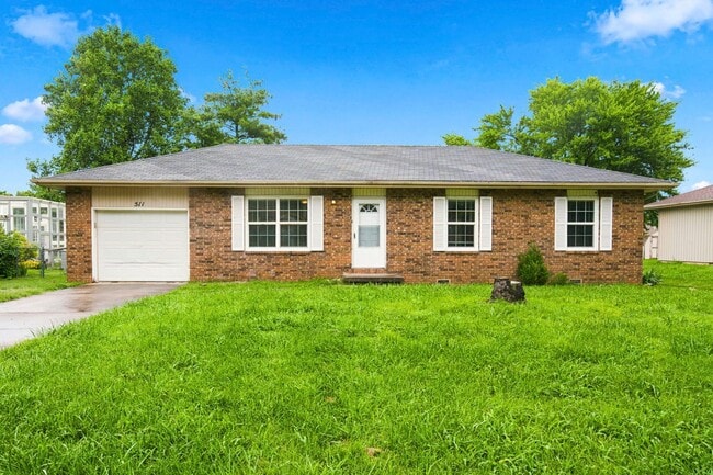 Building Photo - Charming 3 Bedroom Home with Washer & Dryer, Garage & Storage Shed