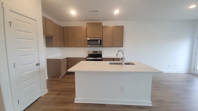 Photo - "Charming 3-Bed Oasis with Granite Elegance on Discovery Point Drive!"