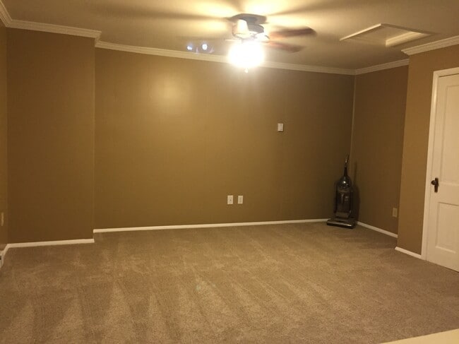 Photo of Living room from top of entry steps - 3558 Marion Avenue Unit Apartment C