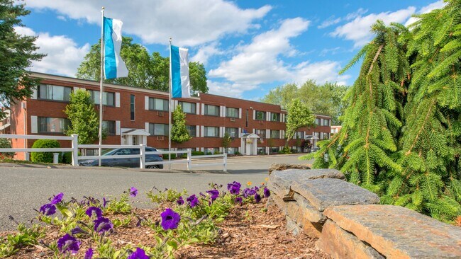 Surrounded by lush greenery and thoughtfully designed landscaping, Country Manor Apartments provides a picturesque place to call home.