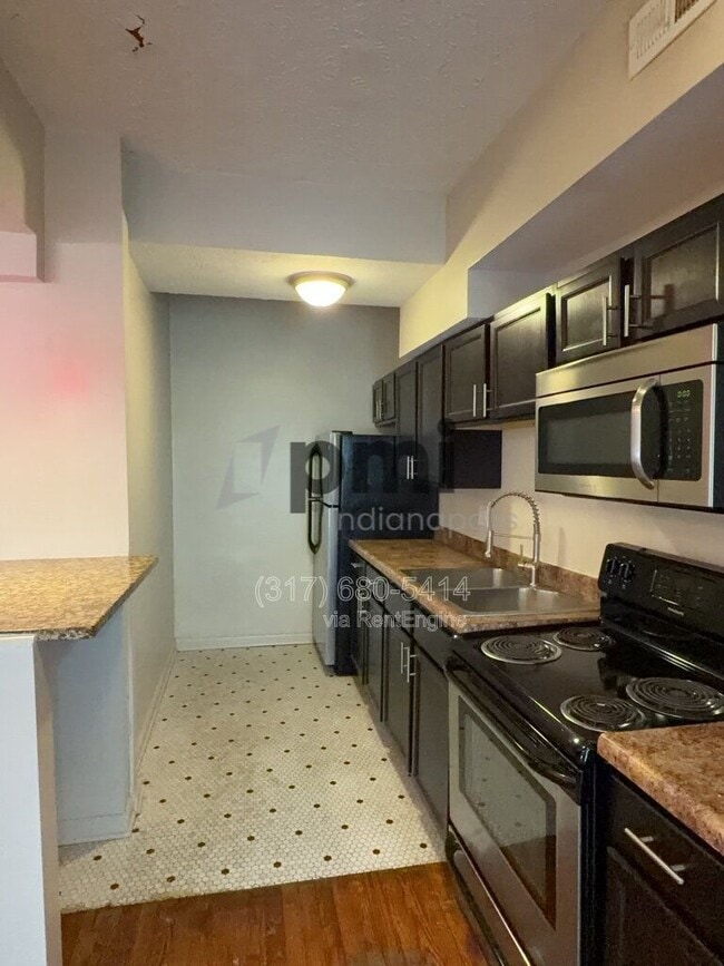 Building Photo - 1 W 28th St Unit Apt 205
